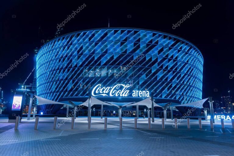 estadio iluminado por la noche en abu dhabi
