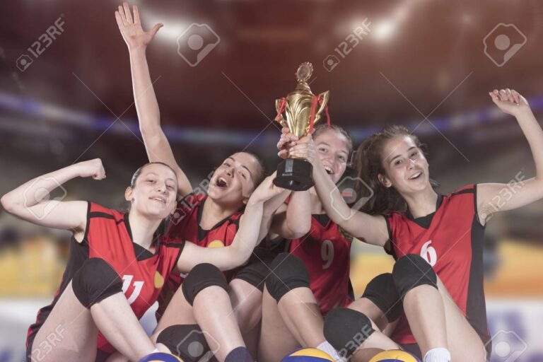 jugadores de voley celebrando una victoria